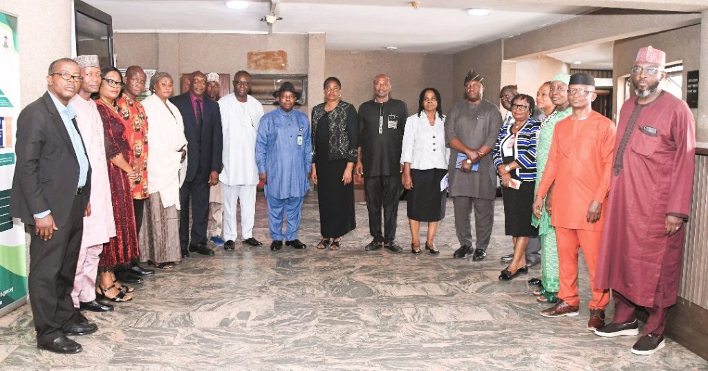 Outgoing Permanent Secretary, FMIST, Mrs.  Esuabana Nko Asanye (8th right) In-coming Permanent Secretary, Federal Ministry of Innovation, Science and Technology (FMIST) Mr. Philip Ndiomu Ebioge (8th left) Director, Planning Research and Policy Analysis Department Mrs. Salamatu Mohammed (5th left) Head Press and Public Relations Mrs. Pauline Sule (3rd right) Director, Legal Services Department Mr. Obi Agusiobo (6th left) Director, Environmental Science and Technology Department FMIST, Mrs. Ogwuche Bernadette (6th right) Director, Information and Technology Department Mr. Ikechukwu Okoro (2nd right) and other management staff in a group photograph.